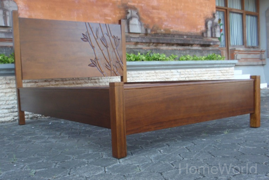 Note the decorative hand-carved details on the headboard of the Foliage Queen Size Bed by Jamieson Furniture