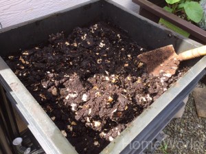 My compost bin is kept in the backyard, protected by wind and direct sunlight most of the day.
