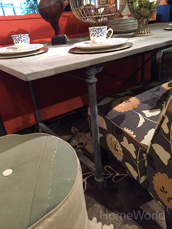 Designer Angelo Surmelis uses reclaimed wood and iron pipes to create a an industrial dining table.