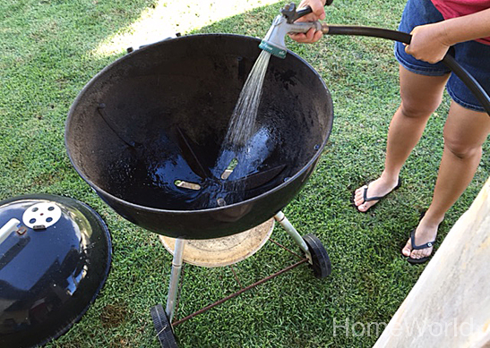 Next, hose down the inside to remove any loose particles (i.e. burnt food from the last BBQ!)
