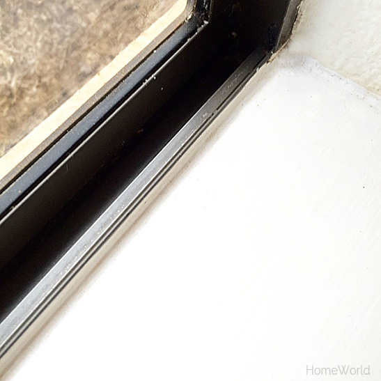 clean window tracks after using mixture of baking soda and vinegar all natural household products for cleaning